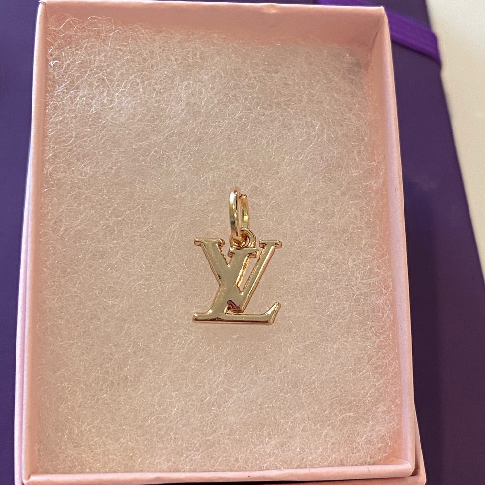 Authentic Louis Vuitton pendant charm